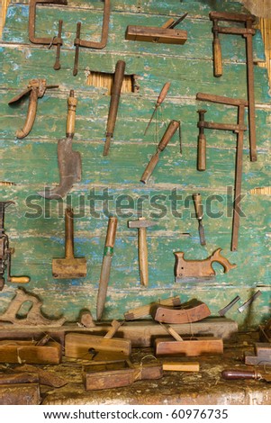woodworking tools of antique carpentry - old bench with carpenter's 