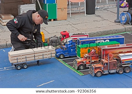 FORLI\', ITALY - OCTOBER 10: unidentified man working on the truck models during the modeling show at \
