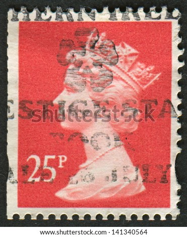 UK-CIRCA 1993: A stamp printed in UK shows image of Elizabeth II is the constitutional monarch of 16 sovereign states known as the Commonwealth realms, in Rose Red, circa 1993.