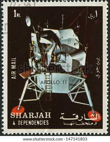 SHARJAH - CIRCA 1972:A stamp printed in Sharjah shows image of the Apollo 11 was the spaceflight that landed the first humans on the Moon, Neil Armstrong and Buzz Aldrin, on July 20, 1969, circa 1972.