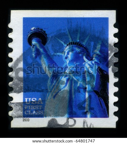 USA - CIRCA 2000: A stamp dedicated to the The Statue of Liberty (Liberty Enlightening the World) is a colossal neoclassical sculpture on Liberty Island in New York Harbor, circa 2000.