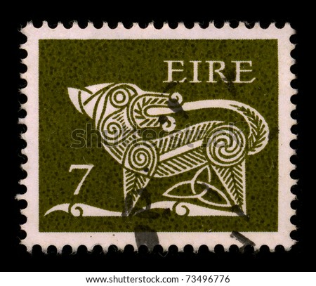 EIRE - CIRCA 1980: A stamp dedicated to The dog (Canis lupus familiaris) is a domesticated form of the gray wolf, a member of the Canidae family of the order Carnivora, circa 1980.