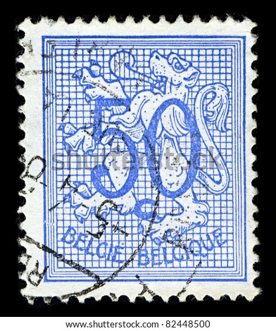 BELGIUM-CIRCA 1951:A stamp printed in BELGIUM shows image of The coat of arms of the Kingdom of Belgium bears a lion, called the Belgian Lion, or Leo Belgicus, circa 1951.