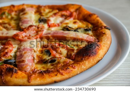 Pizza with sausage in pizza fast food restaurant