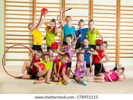 Group of little happy gymnasts