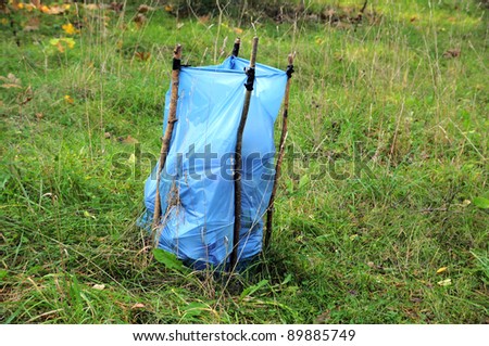 garbage bag in forest