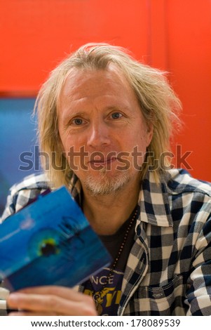HEIDELBERG, GERMANY -Ã?Ã? FEBRUARY, 2014: Finnish guitarist Jyrki Muddy Manninen of the band Wishbone Ash at a autograph session for fans on February 18, 2014 in Heidelberg, Germany