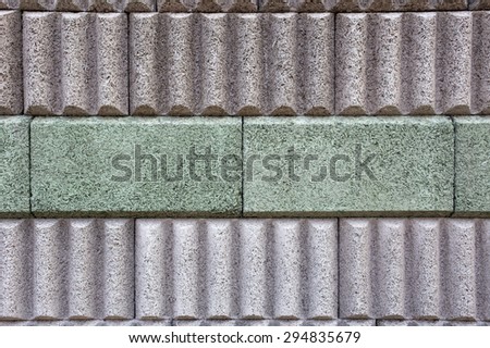 Closeup of a noise barrier wall, background