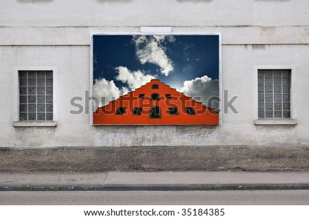 red facade and blue sky on a billboard