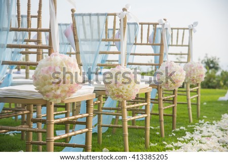 Wedding chair decorated with flowers.