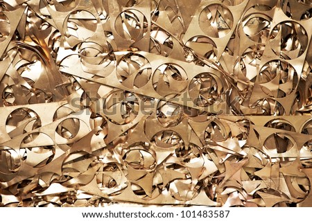 Yellow metal brass scrap materials recycling backround of punching waste