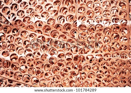 Red metal copper scrap materials recycling backround of punching waste