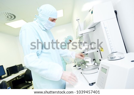 Pharmaceutical researcher working with granulate and powder flow