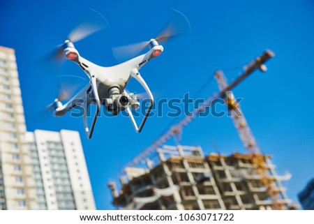 drone survellance over construction area. building site inspection.
