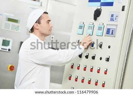 pharmaceutical factory man worker operating water preparation production line at pharmacy industry manufacture factory