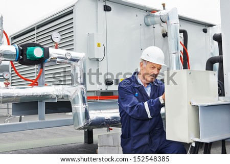 Senior Adult Ventilation Electrician Builder Engineer At Work