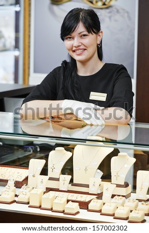 Portrait of smiling female sales assistant in jewelry shop