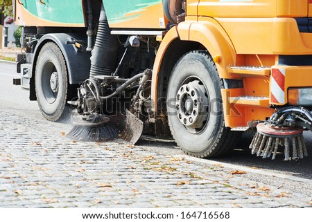 Process of urban street cleaning. Municipal machanical truck