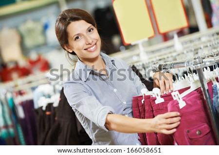 Young Woman Pants During Clothing Shopping At Supermarket Store