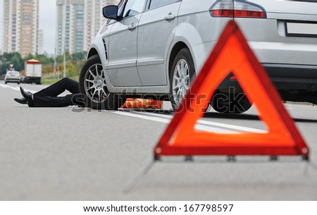 Road accident. Knock down pedestrian and upset driver in front of automobile crash car collision