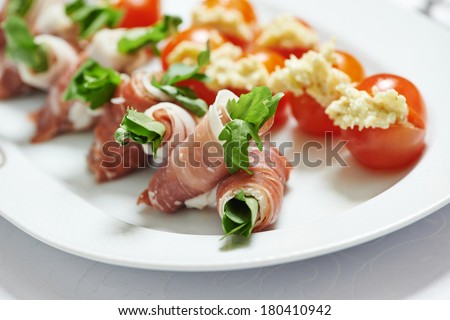 catering services background with snacks and food on plate  in restaurant