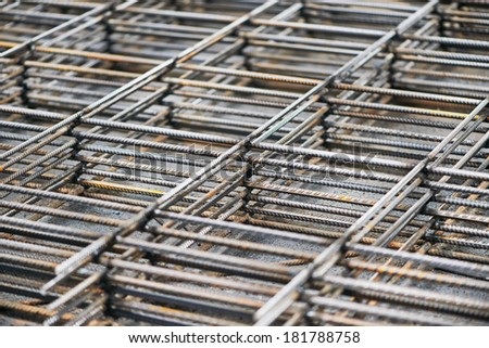 heap of metal steel reinforcing rods lattice background