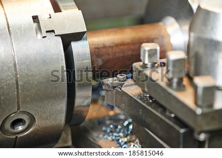 industrial metal work machining process of shaft by cutting tool on lathe