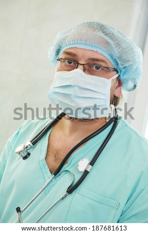 anesthesiologist doctor in uniform preparing narcosis anesthesia during heart transplantation operation at cardiac surgery clinic