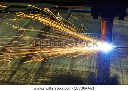 Industrial laser or plasma cutting processing manufacture technology of flat sheet metal steel material with sparks