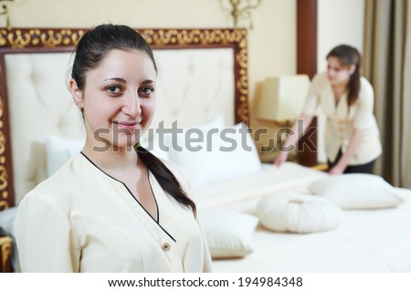 Hotel service. female housekeeping workers at inn room
