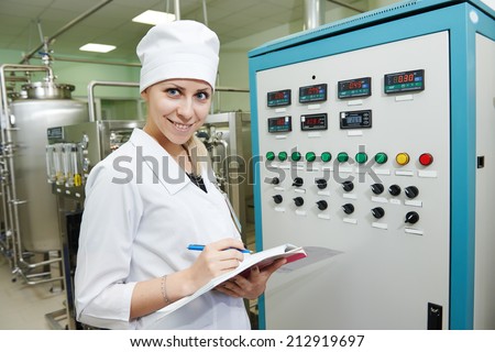 pharmaceutical factory woman worker operating water preparation production line at pharmacy industry manufacture factory