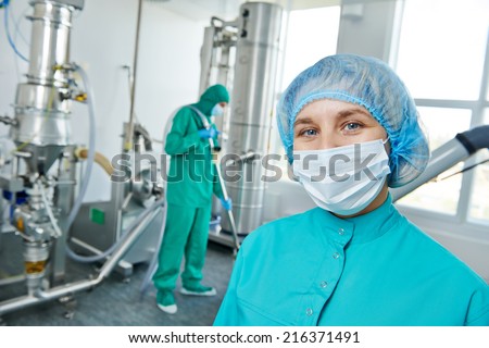 portrait of female pharmaceutical factory worker in pharmacy industry manufacture factory
