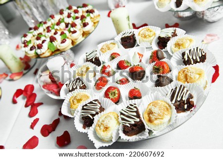 catering service sweets strawberries with chocolate at party