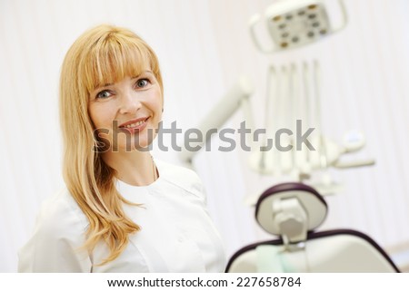 confident dentist orthodontist female doctor portrait at working place