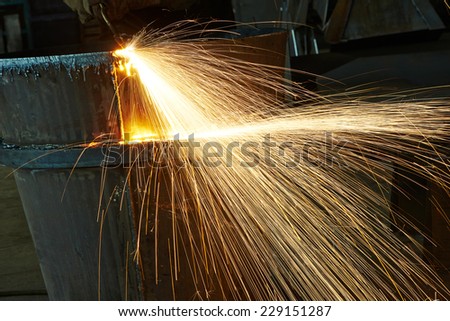 weld spatter of melting metal at industrial factory