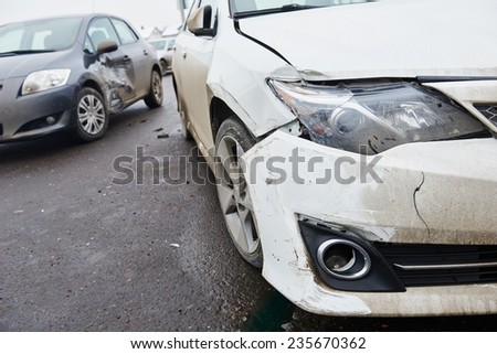 car crash accident on street, damaged automobiles after collision in city