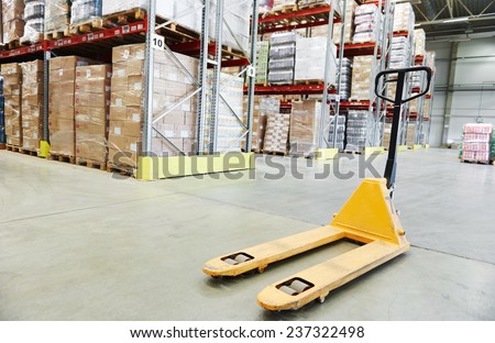Manual forklift pallet stacker truck equipment at warehouse