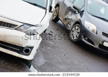 car crash accident on street, damaged automobiles after collision in city