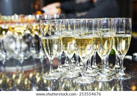 catering services. glasses with wine in row background at restaurant party