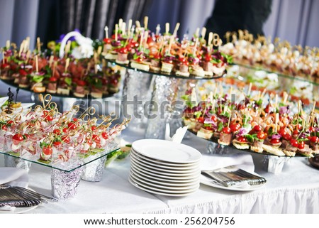 catering services background with snacks on guests table in restaurant at event party