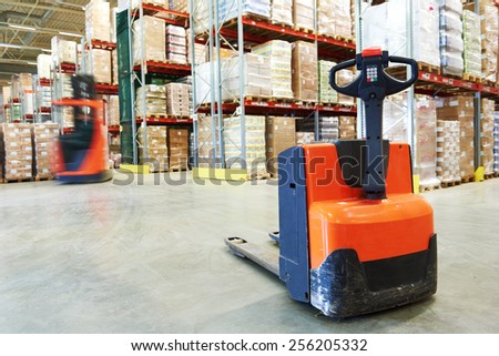 Manual forklift pallet stacker truck equipment at warehouse