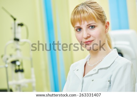 Ophthalmology. portrait of female optometrist optician doctor in eye correction medic clinic