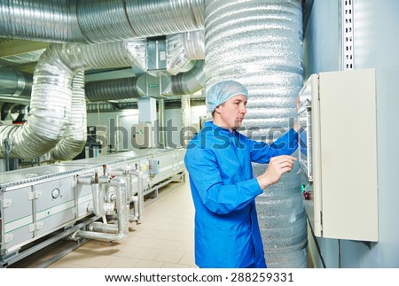 pharmaceutical man worker operating air conditioning equipment at pharmacy industry manufacture factory