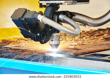metal working. Plasma or Laser cutting technology of flat sheet metal steel material with sparks