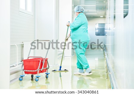 Floor care and cleaning services with washing mop in sterile factory or clean hospital