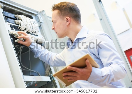 Networking service. network engineer administrator checking server hardware equipment of data center