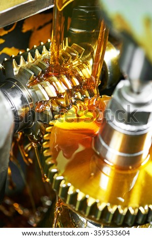 metalworking industry. tooth gear cogwheel machining by hob cutter mill tool. Authentic shot in challenging conditions. maybe little blurred