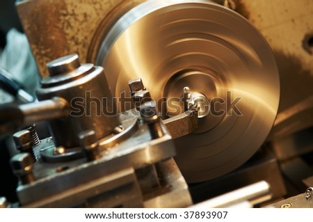 Facing operation of a metal blank on turning machine with cutting tool