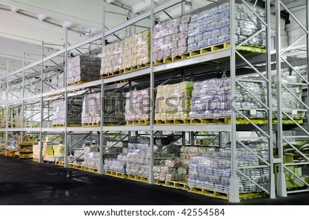 Pile of food production stacked in warehouse shelves