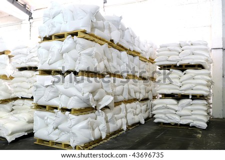 storehouse with stacked sacks of meal